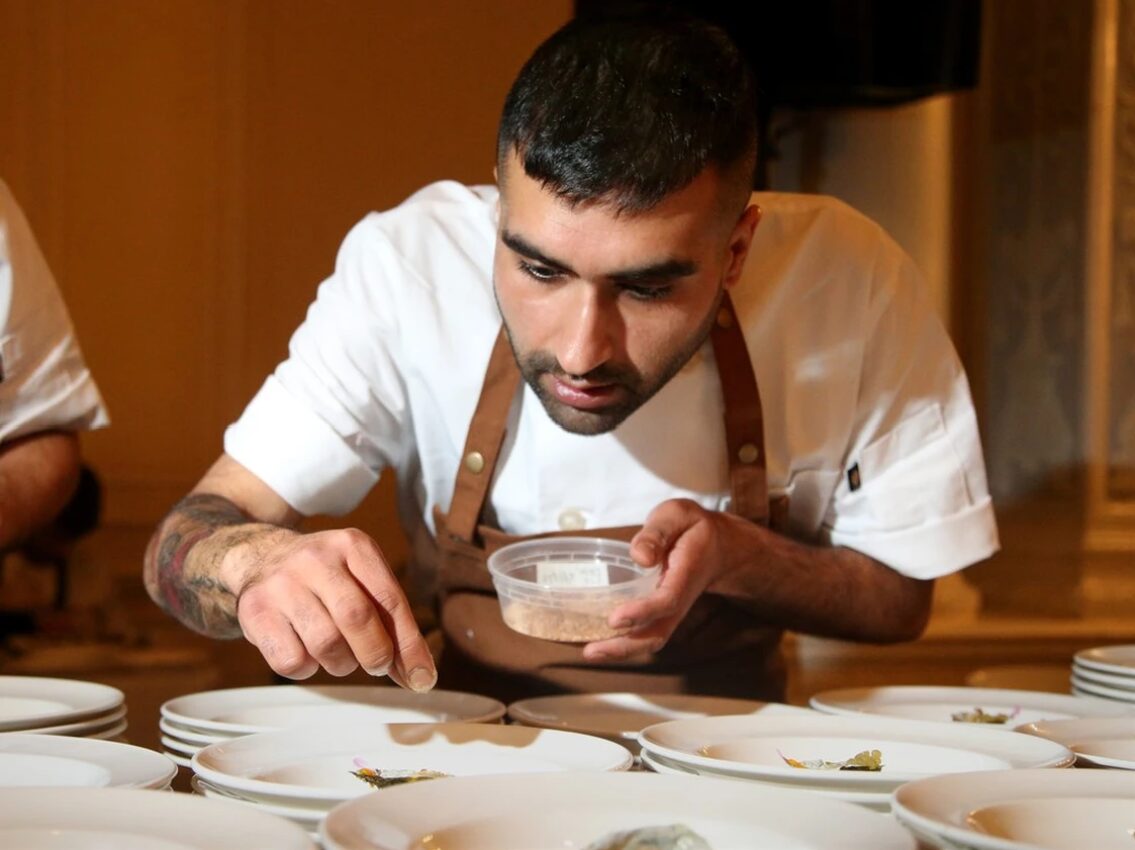 Chef Raghav Chaudhary plating at the Canadian Culinary Championship